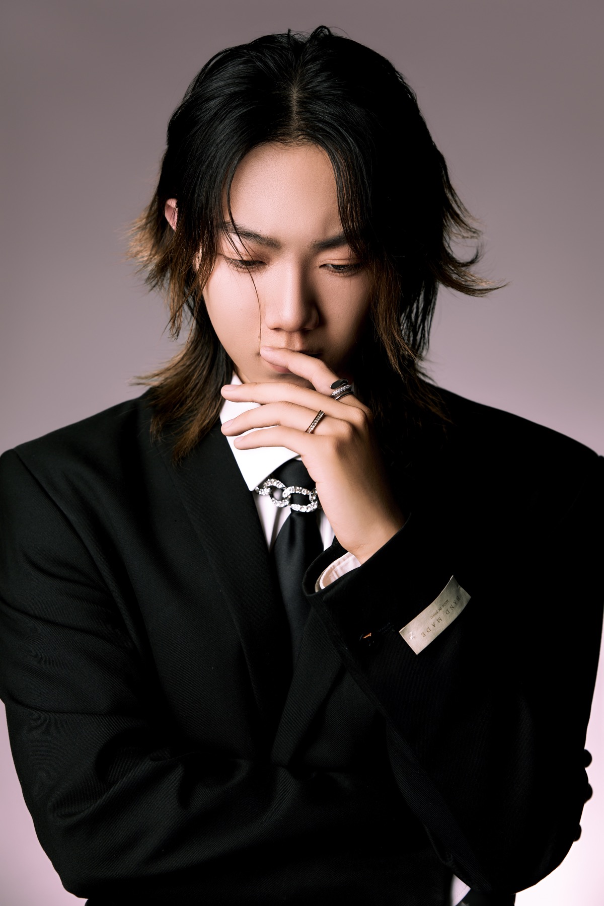 Thoughtful studio portrait of Wayne Wen